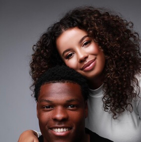 Denzel Dumfries with his partner.